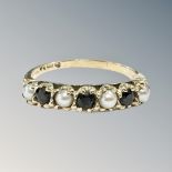 A 9ct yellow gold sapphire and seed pearl dress ring, size N/O, 1.8g.