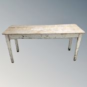 A 19th century pine kitchen preparation table.