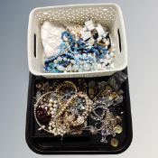 A tray and a basket containing costume jewellery, beads, necklaces etc.