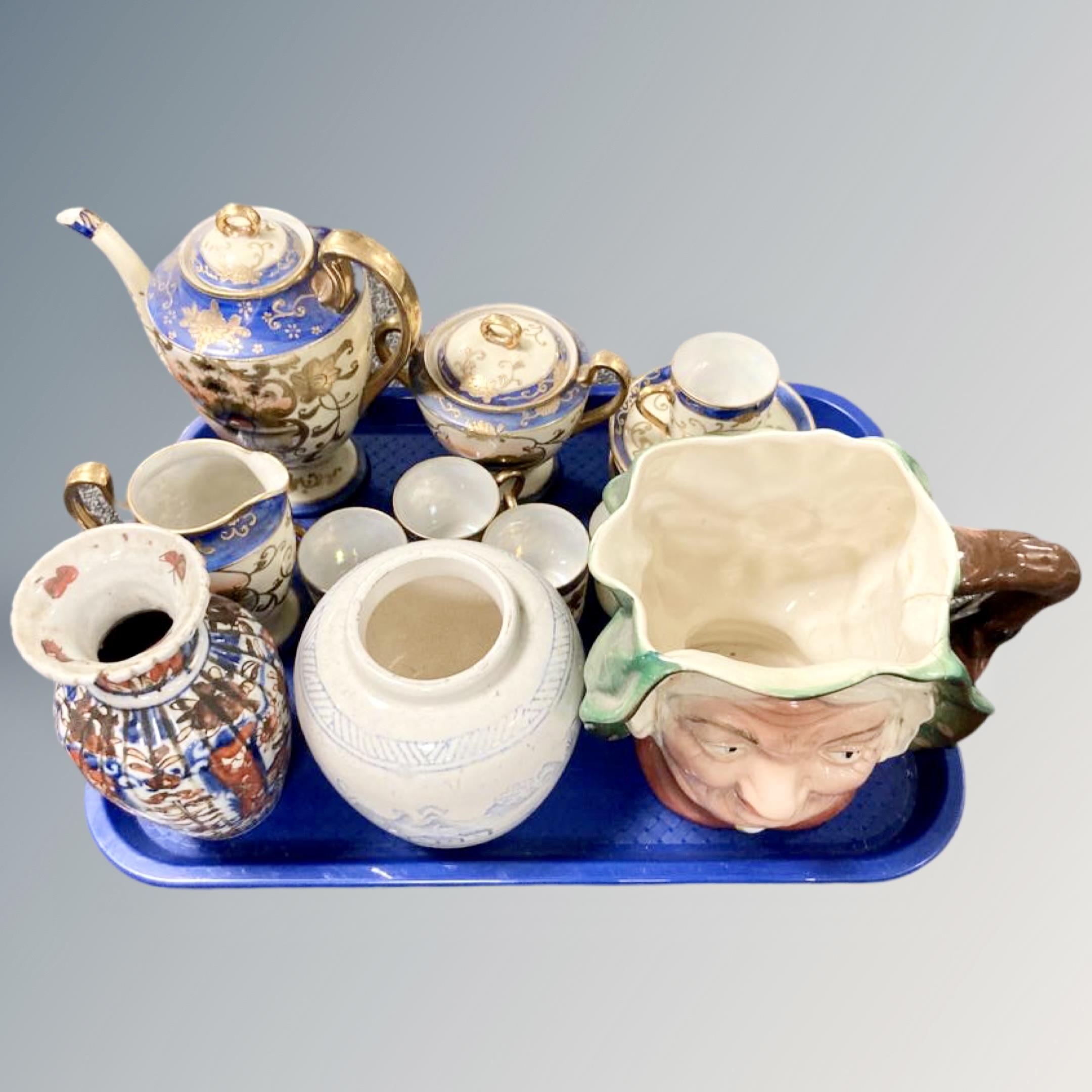 A tray containing Noritake gilded china, a Japanese vase, Beswick character pot.
