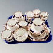A tray containing a Staffordshire English tea set.