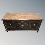 An Edwardian panelled oak blanket box.