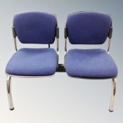 A double fixed reception seat.