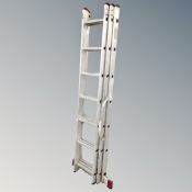 An aluminium triple section extending ladder.