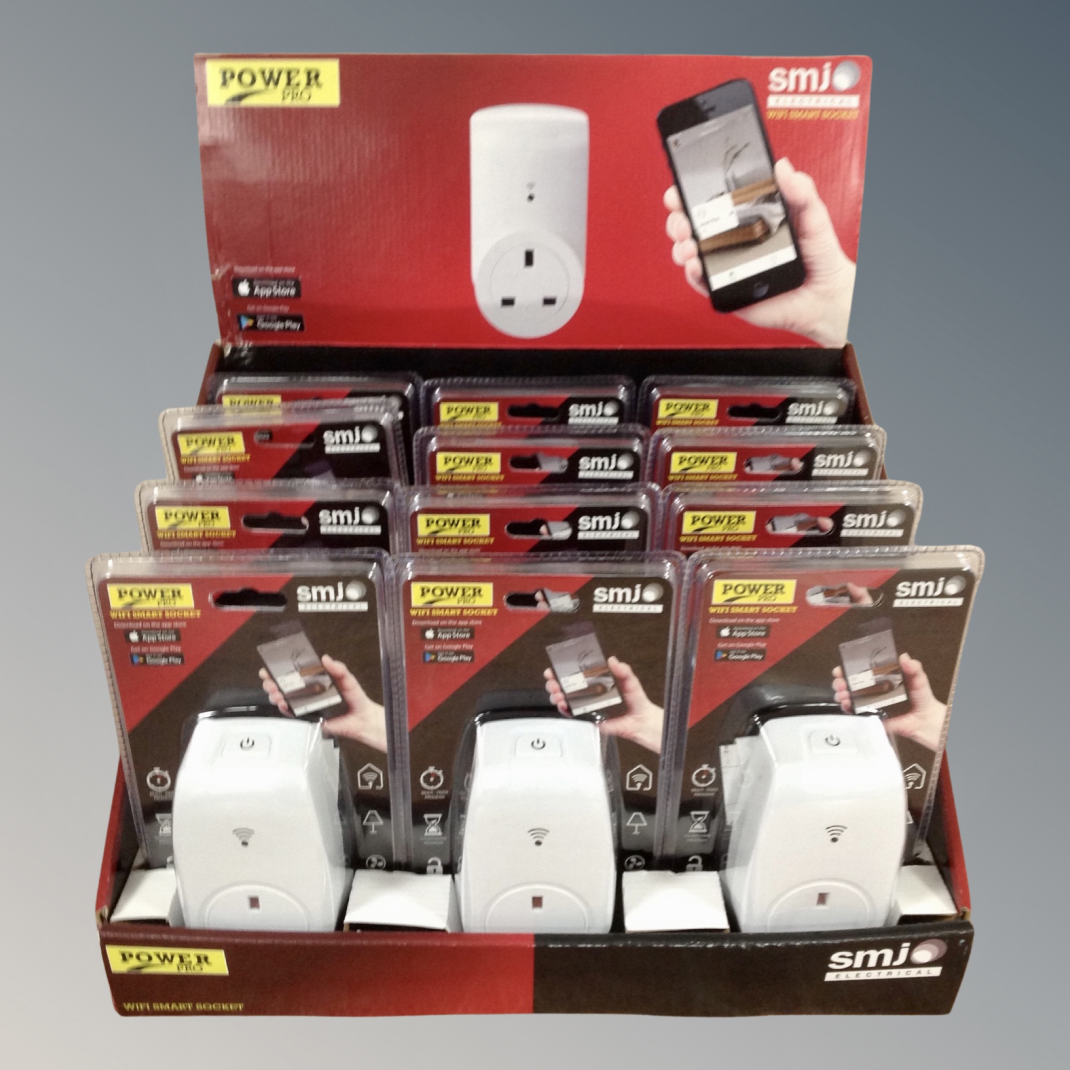 A retail display box containing SMJ smart sockets.