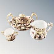 Three pieces of Royal Crown Derby china including miniature twin handled jug,