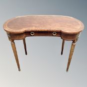A Regency style kidney shaped dressing table (no mirror)