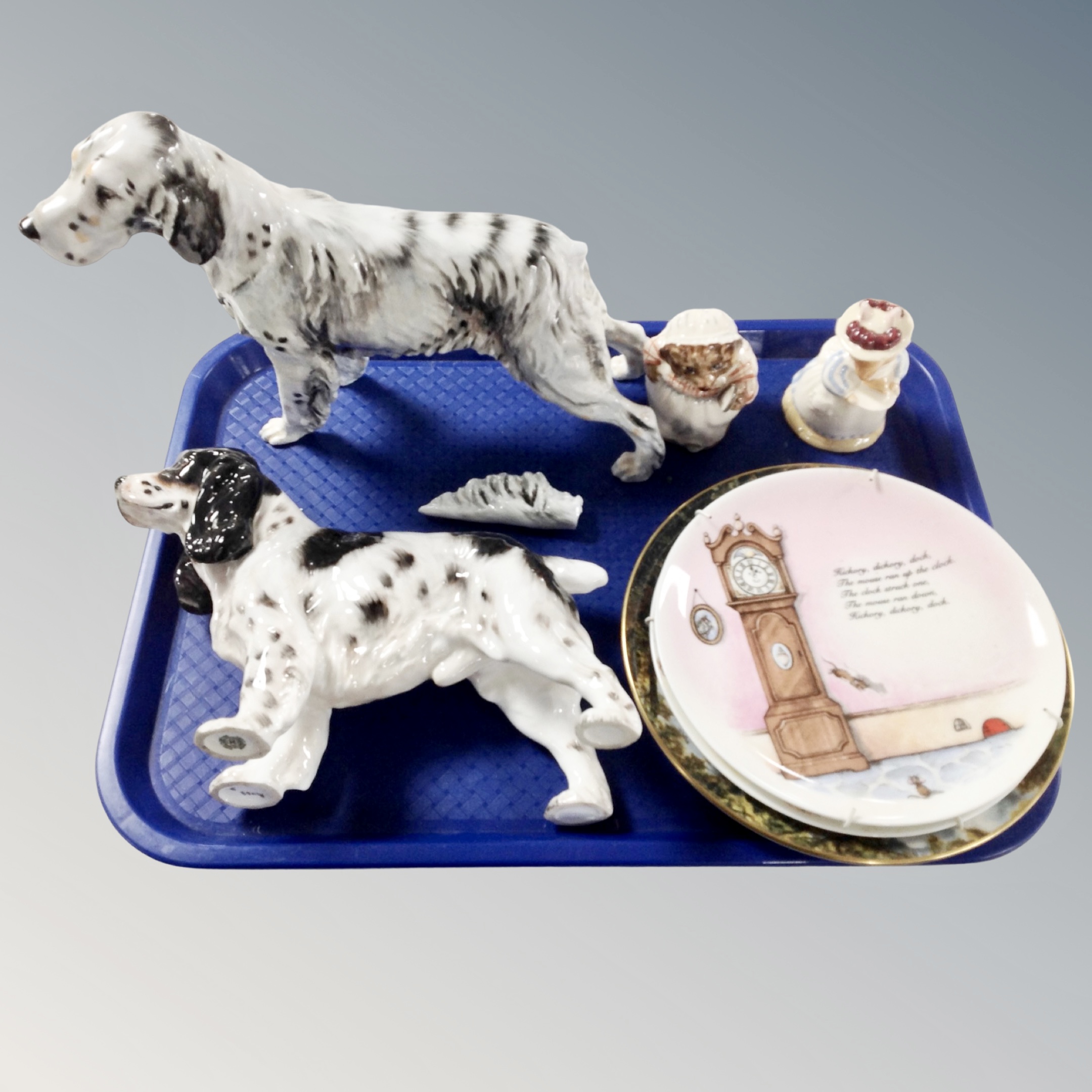 A Royal Doulton figure of a spaniel together with a further figure of a setter (AF),