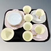 A tray containing an early 20th century Windsor tea set.