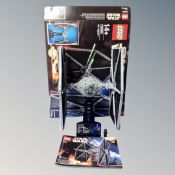 A Lego Star Wars Ultimate Collectors Series 75095 Tie Fighter, with minifigure box and instructions.