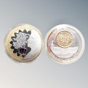 Two oversized commemorative coins,