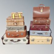 10 assorted vintage luggage cases, wicker baskets, leather briefcase.