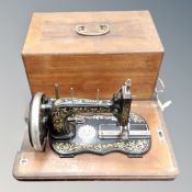 A continental sewing machine in case.