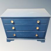 A mid-20th century painted Scandinavian three drawer chest.