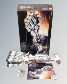 A Lego Star Wars 75244 Tantive IV with mini-figures, box and instructions.