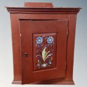A 19th century painted wall cabinet fitted with internal drawers.