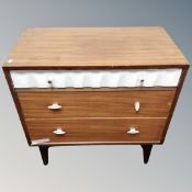 A mid-century three drawer chest.