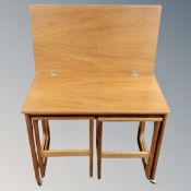 A nest of three mid-20th century McIntosh furniture tables.