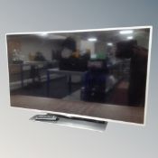 An LG 47" LCD TV with remote.