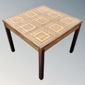 A mid-20th century Danish tile topped square lamp table.