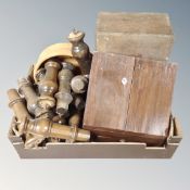 A box containing wooden pieces including a correspondence box, a wooden bowl,