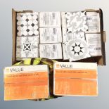 A box containing ceramic tiles, boxes of gloss white wool tiles etc.