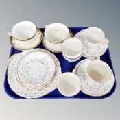 A tray containing a 17 piece Royal Standard Vanity Fair bone china tea service together with two
