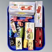 A tray containing 20th century Dinky toys, turntable fire escape with windows 956, horse box 981,