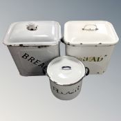 Two vintage enamelled bread bins together with a further enamelled flour bin.