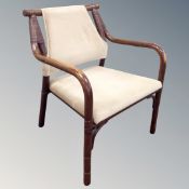 A bamboo and wicker armchair in dralon fabric