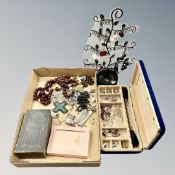 A quantity of costume earrings on stand together with two boxes of costume jewellery,