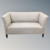A late 20th century Danish two-seater settee in grey fabric