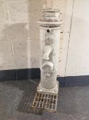 An antique French Bayard cast iron water fountain.