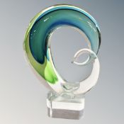 A heavy 10.75" Venetian glass wave sculpture.