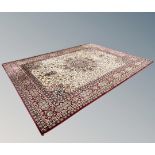 A machine-made carpet of Persian design,