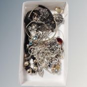 A selection of silver and white metal chains and charms including Equilibrium, Swarovski, Olga,