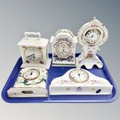 A tray containing five china mantel clocks including Portmeirion, Aynsley and Masons.