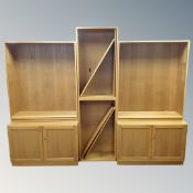 A 20th century Danish Mobel furniture twin section modular bookcase with cupboards below