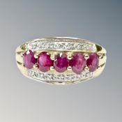 A 9ct gold ruby and diamond set ring, size M CONDITION REPORT: 2.