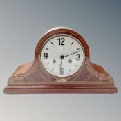 An Edwardian inlaid mahogany eight day mantel clock.