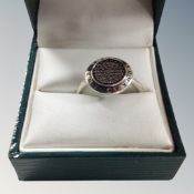 A Pandora silver finger ring with round face, in green box, 3.5g.