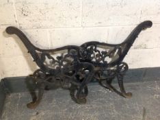 A pair of antique cast iron bench ends.