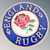 A cast iron wall plaque, England Rugby.