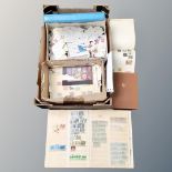 A box of albums and files plus a large quantity of assorted world stamps