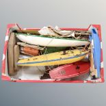 A box of three vintage wooden pond yachts