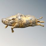 An old metal figure of a wild boar,