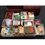 A pallet containing a large quantity of antique and later hardback and soft back books,