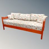 A late 20th century Danish day-bed in floral fabric