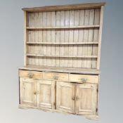 A 19th century pine kitchen dresser,
