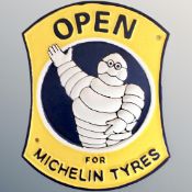 A cast iron wall plaque, Michelin Tyres.